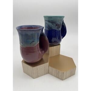 2 Neher Pottery Hand Warmer Mugs 2011 Blue And Plum Glaze Signed
